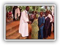 0181 Nieuw gewijde priester met zr. Marcella Mahagi